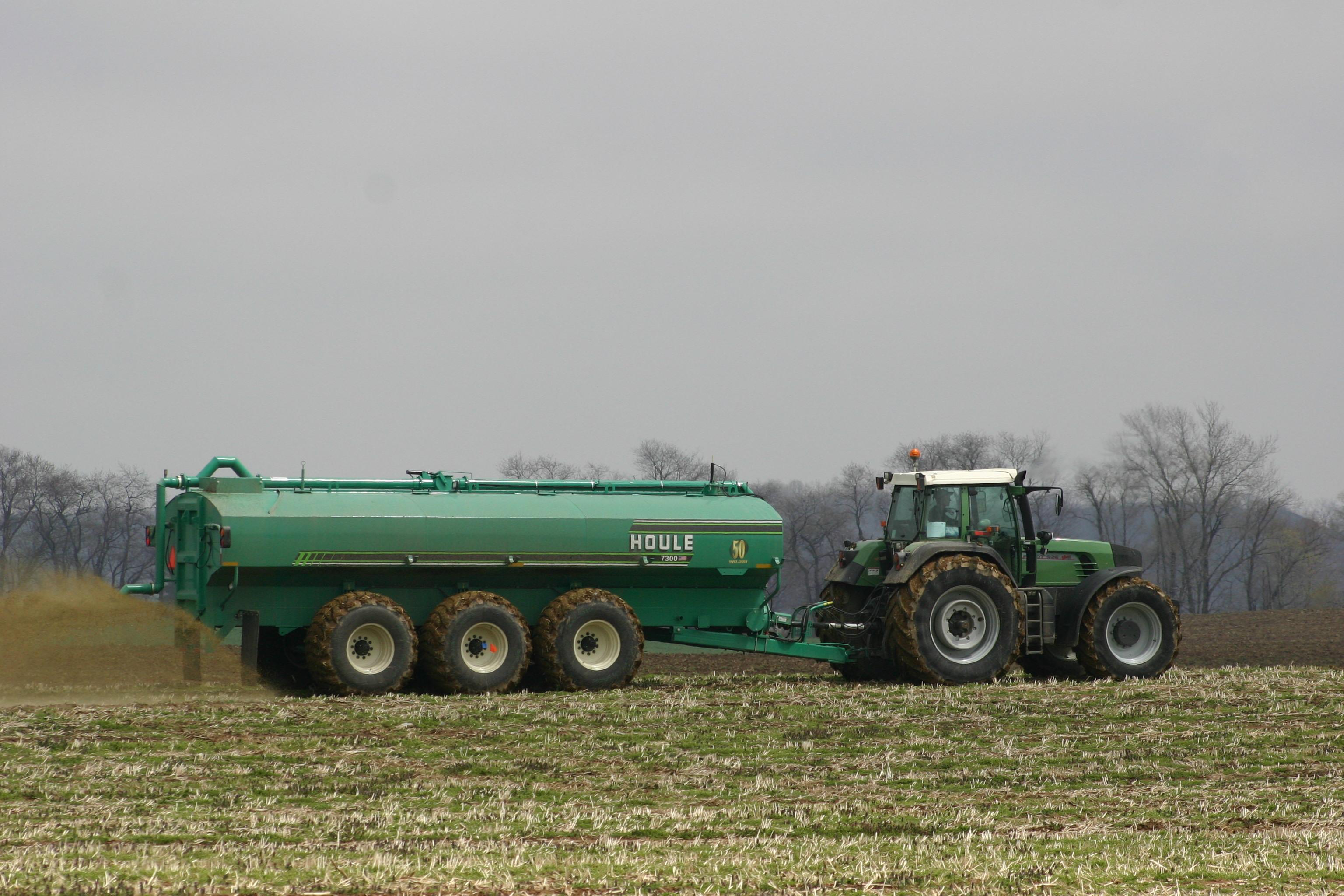 tractor spreading manure