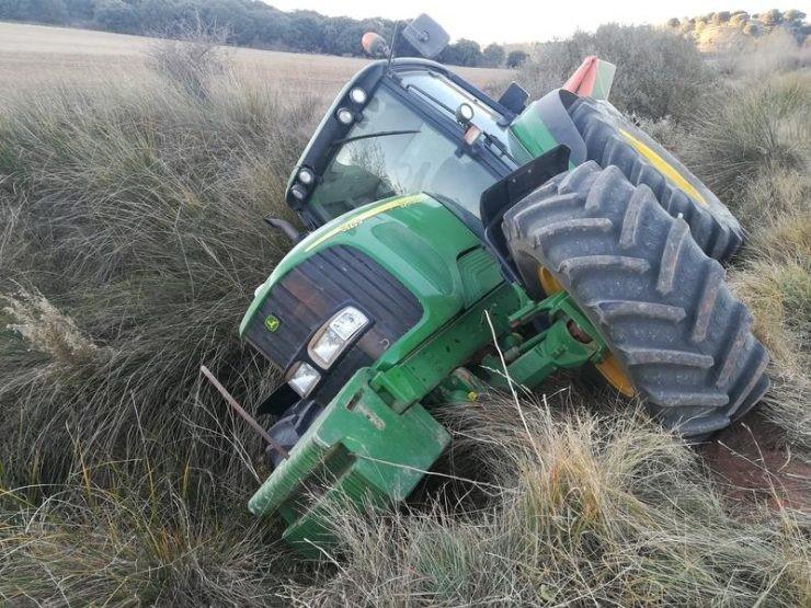 Tractor turned over in a ditch