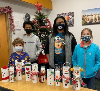 Crafting Club completing snowman crafts