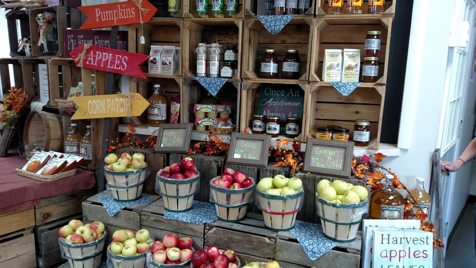 This attractive display is made of stacked apple crates and a few  accent pieces. It’s practical, economical, and can be easily be re- assembled to create a different display.