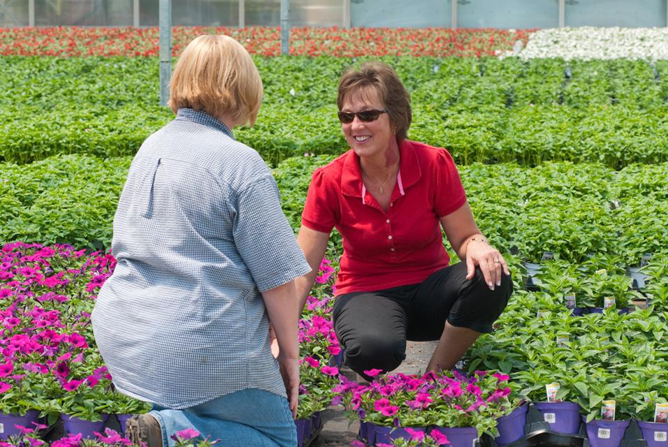 Extension Educator Jenny Rhodes, visiting an agricultural business. 