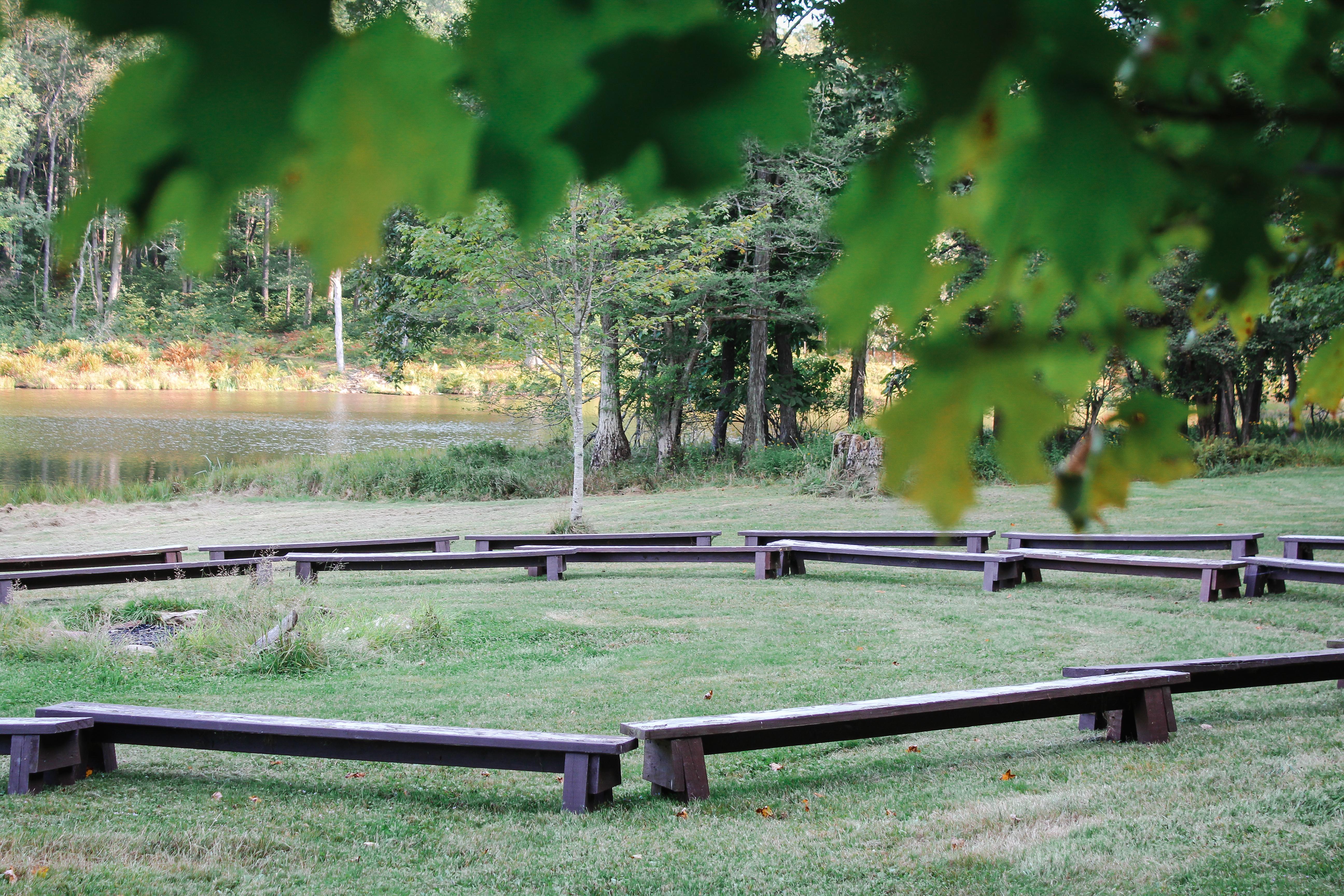 Campfire circle with benches surrounding the fire pit.