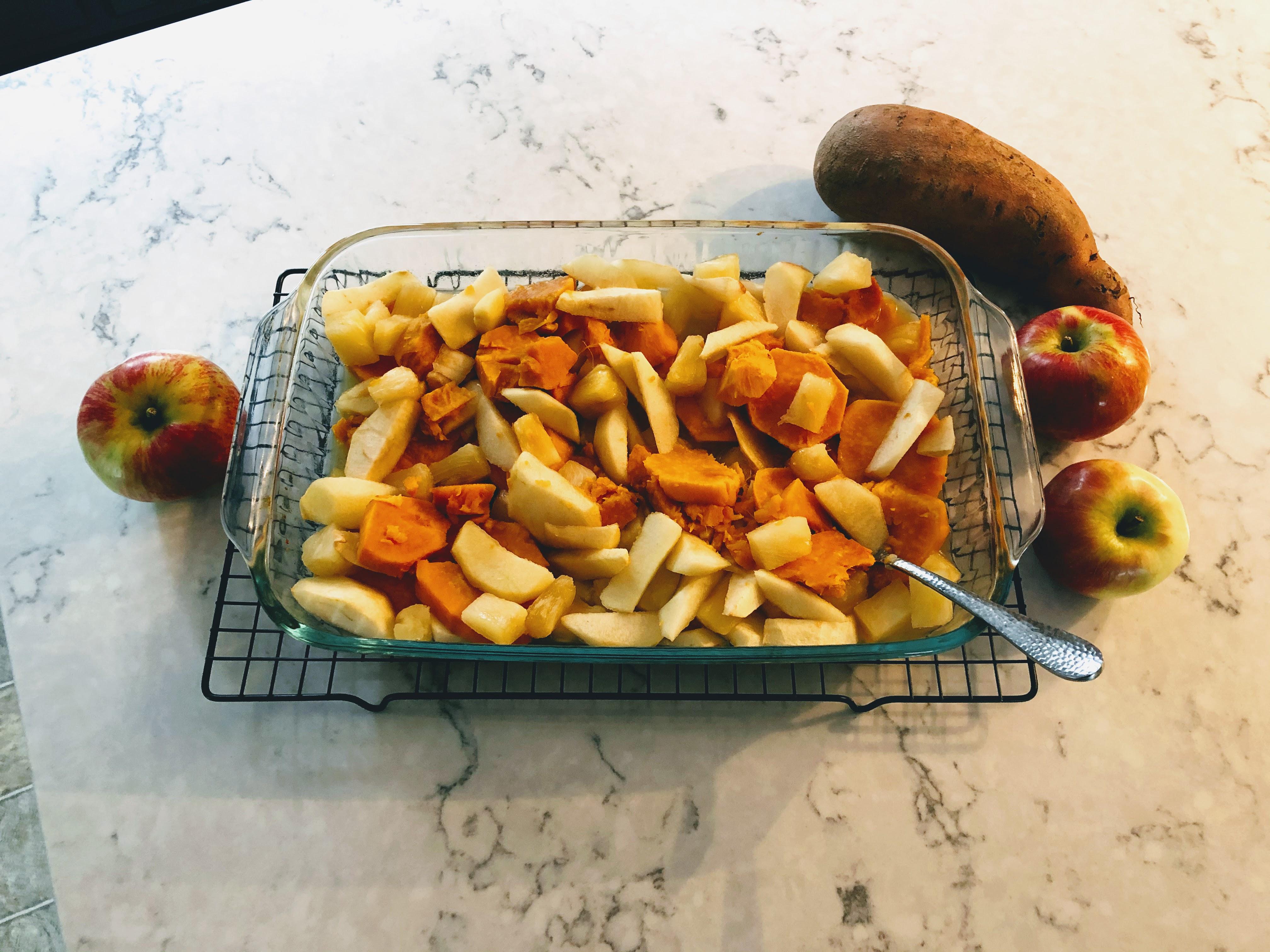 Apples and sweet potatoes in a baking dish