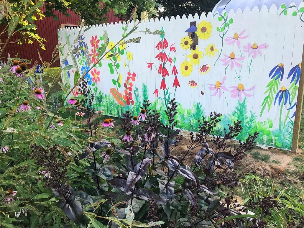 Fence painted with flowers