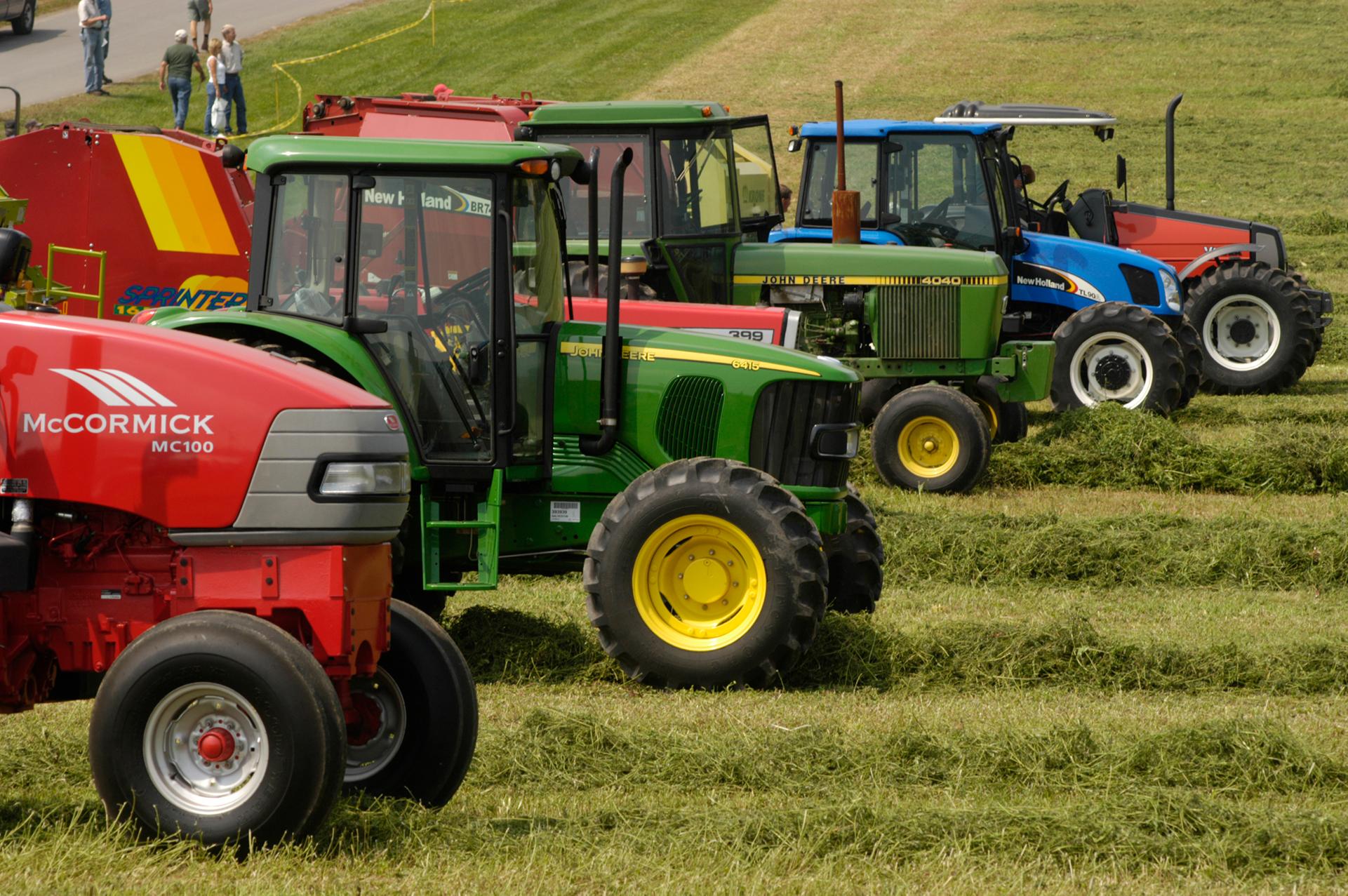 A line of different types of tractors 
