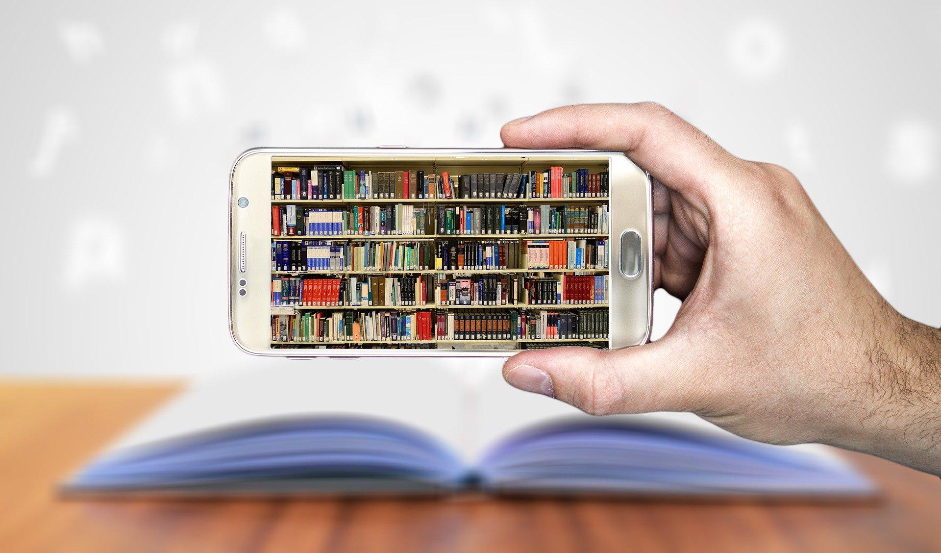 Picture of a library in a cell phone screen