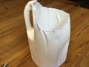 Completed milk carton that has had the top cut off.