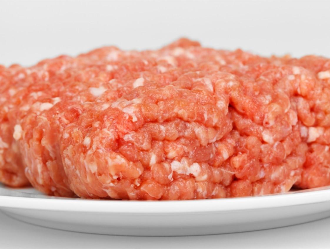 Plate with uncooked ground beef