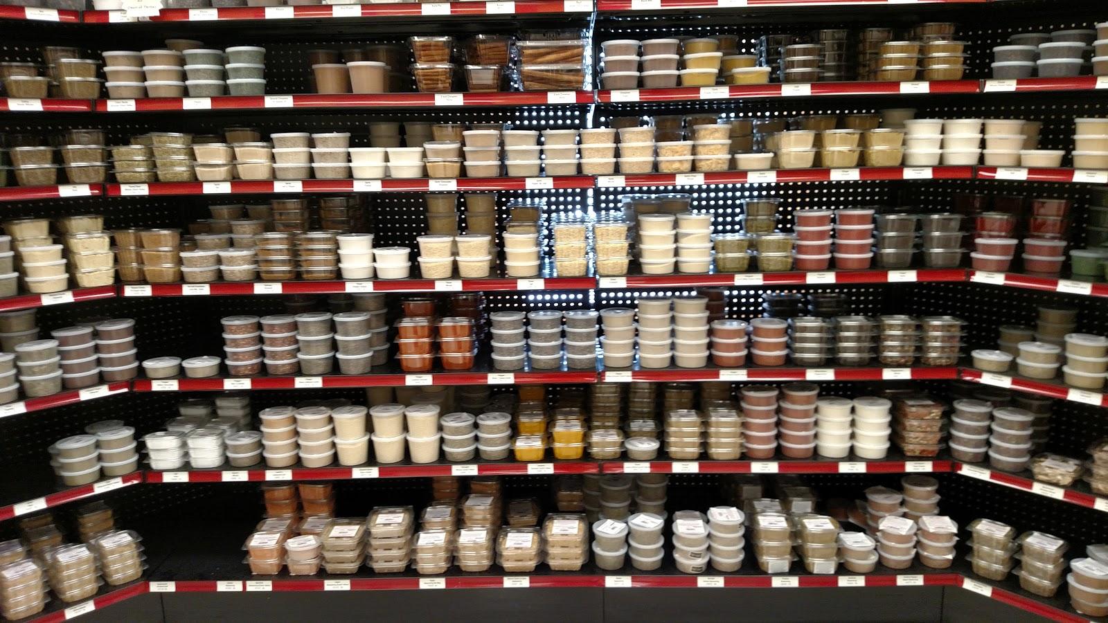 This is the “spice room” at Windy Knoll Market, Chambersburg, PA. Note how the black shelving sets off the color and design of the containers.
