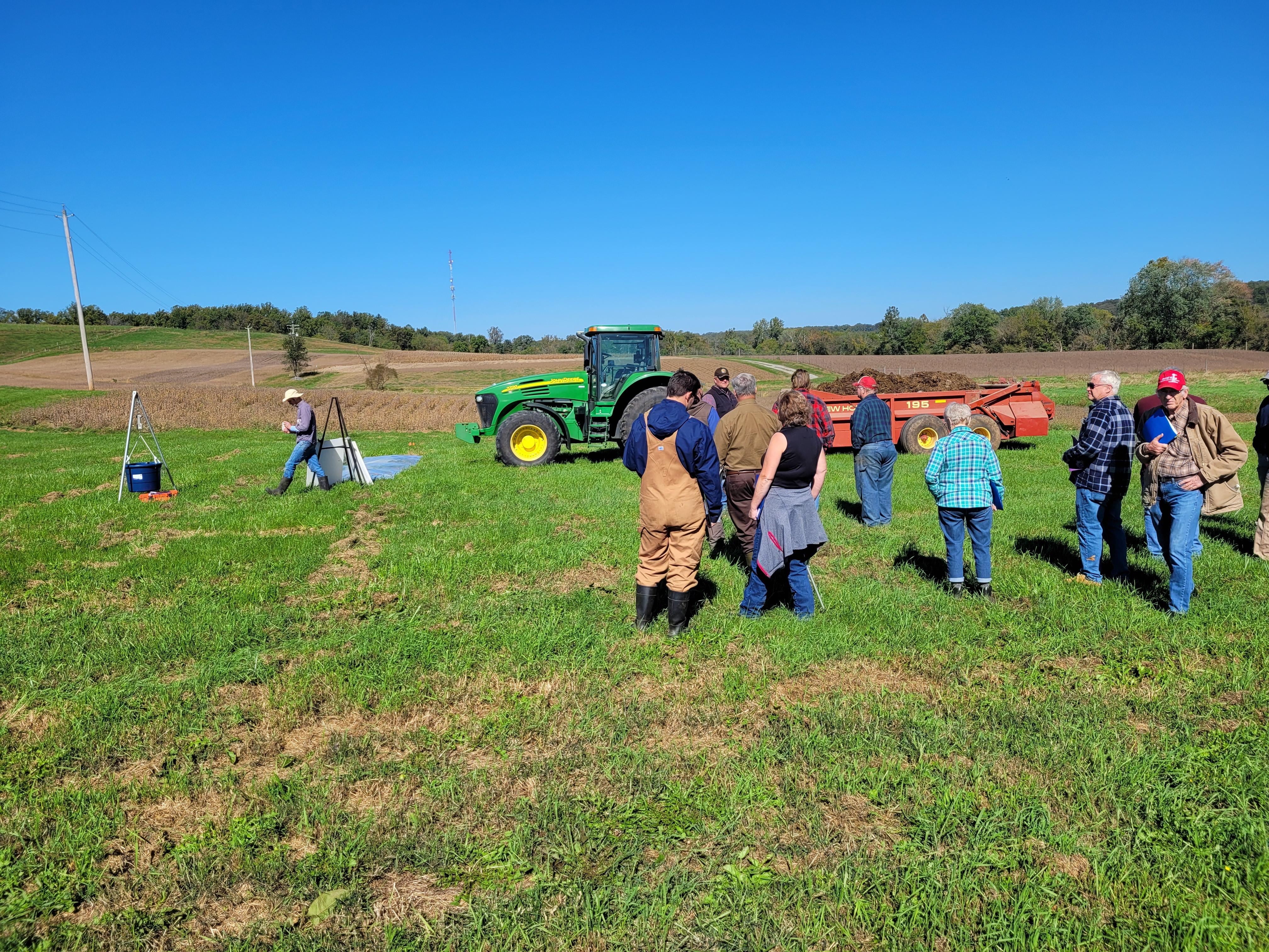 Participants calibrate a manure spreader at practical experiences in nutrient management workshop 2021