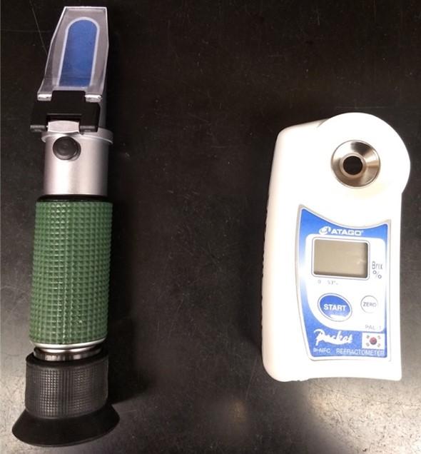 Figure 6. A hand-held manual refractometer (left) and digital refractometer (right) measure soluble solids contents of an extracted fruit apple juice sample.  Photo: Macarena Farcuh, University of Maryland.