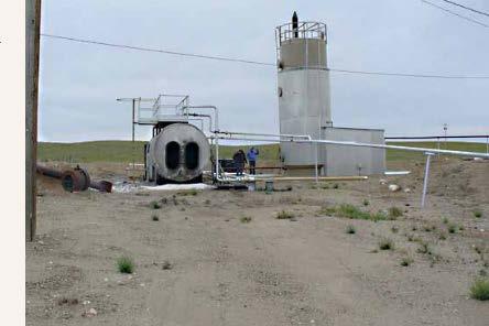 Researchers investigate an abandoned well site. Photo: Joanna Thamke, USGS