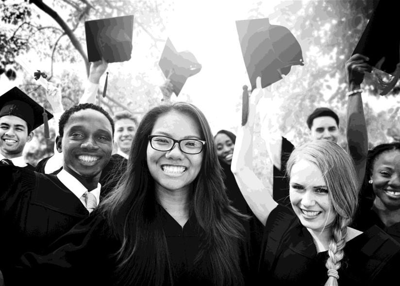 graduating college students wearing cap and gown.