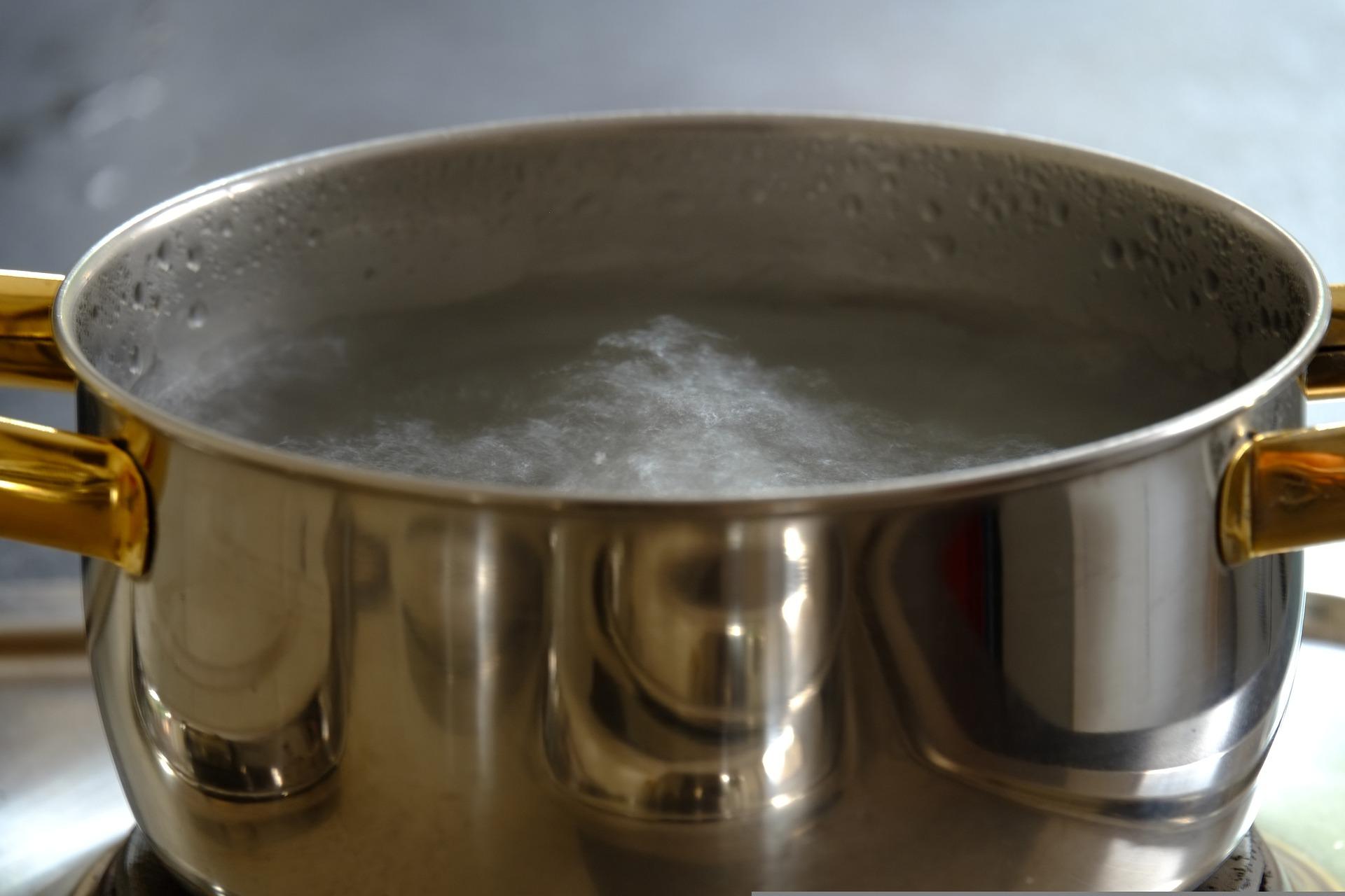 Stainless steel pot with boiling water