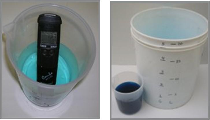 two measuring buckets and  cup. One is calibrating EC with meter.