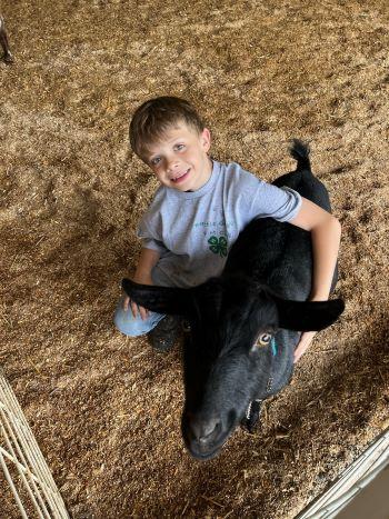 Battle Creek 4-H Club Youth with his goat