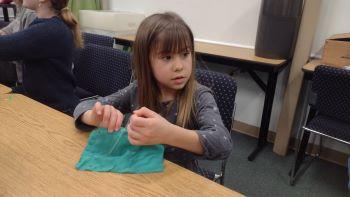 Chesapeake Clover Member sewing a project