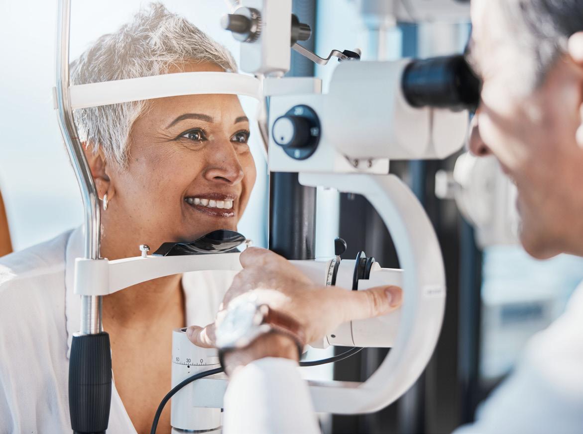 A skilled eye doctor is conducting a thorough eye examination on an elderly woman.