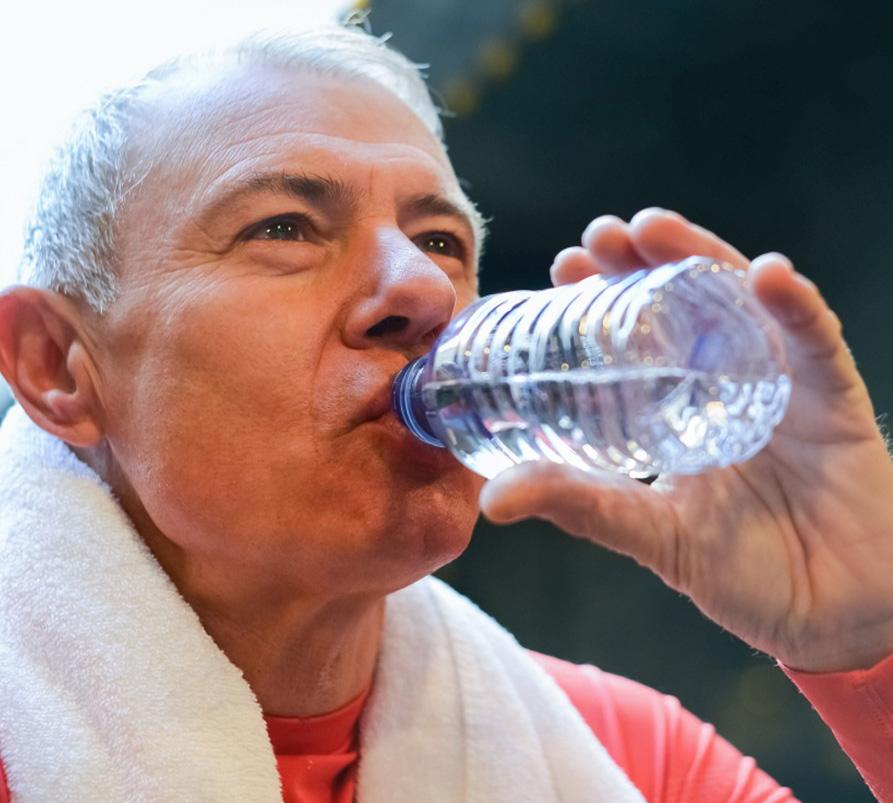 Senior citizen drinking water