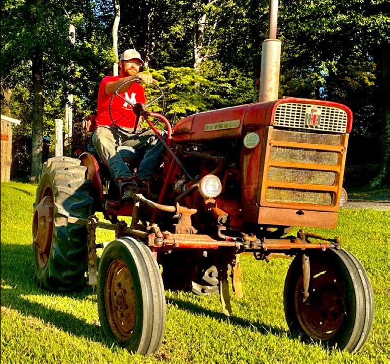 Picture of Nathan Hepp on a tractor