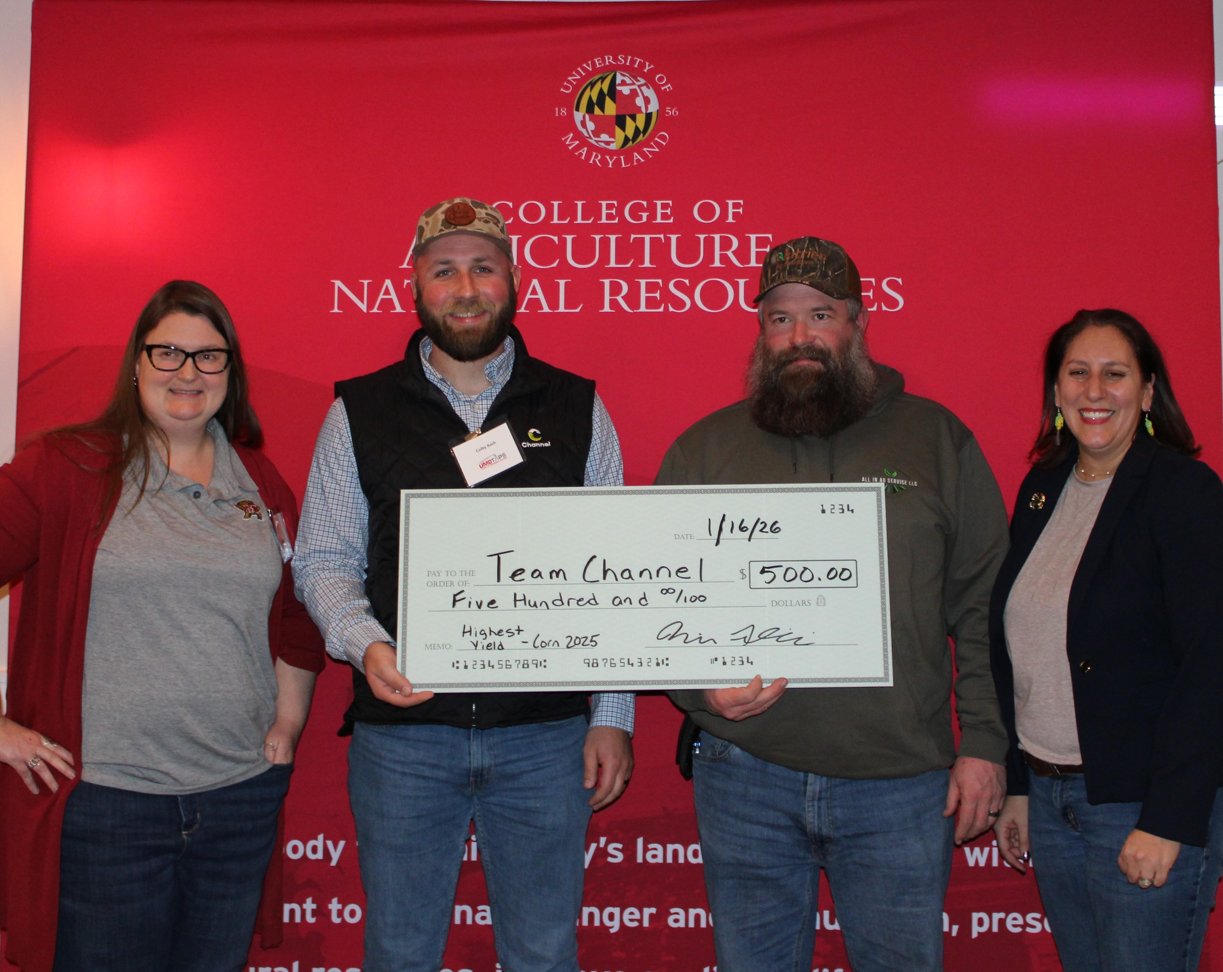  Team Channel also won the Most Profitable award in 2025, earning $70.15 per acre. Pictured here, from left to right, Dr. Kelly Hamby (UMD-TAPS project PI), Colby Rash, Mike Wood, and Dr. Nicole Fiorellino (UMD-TAPS project PI).