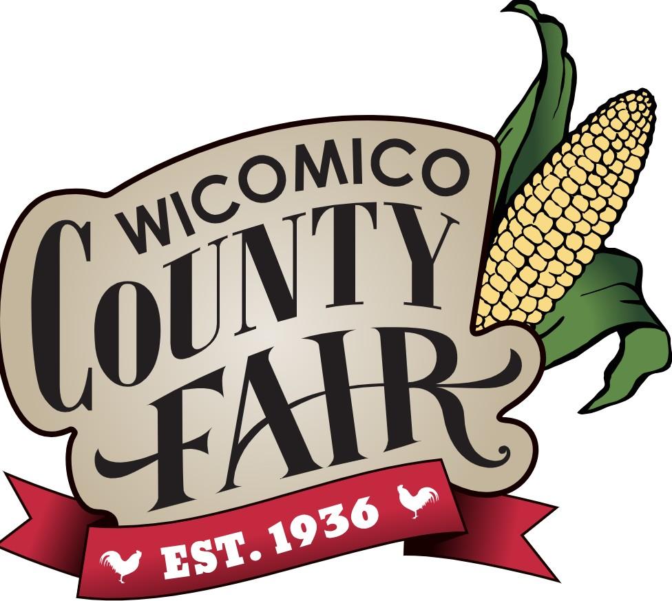 "Wicomico County Fair" in old-time font inside a brown banner, with an ear of corn to the right. Red ribbon featuring "Est. 1936" underneath.
