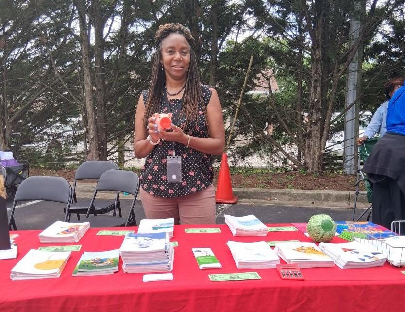 FCS Educator Dr. Denise Joseph with information materials