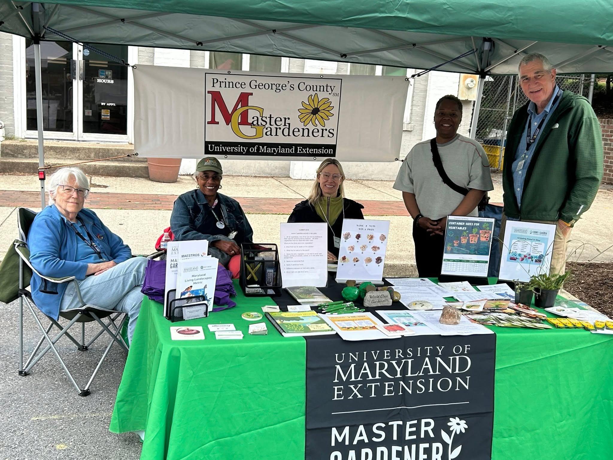 Master Gardeners at a plant clinic table